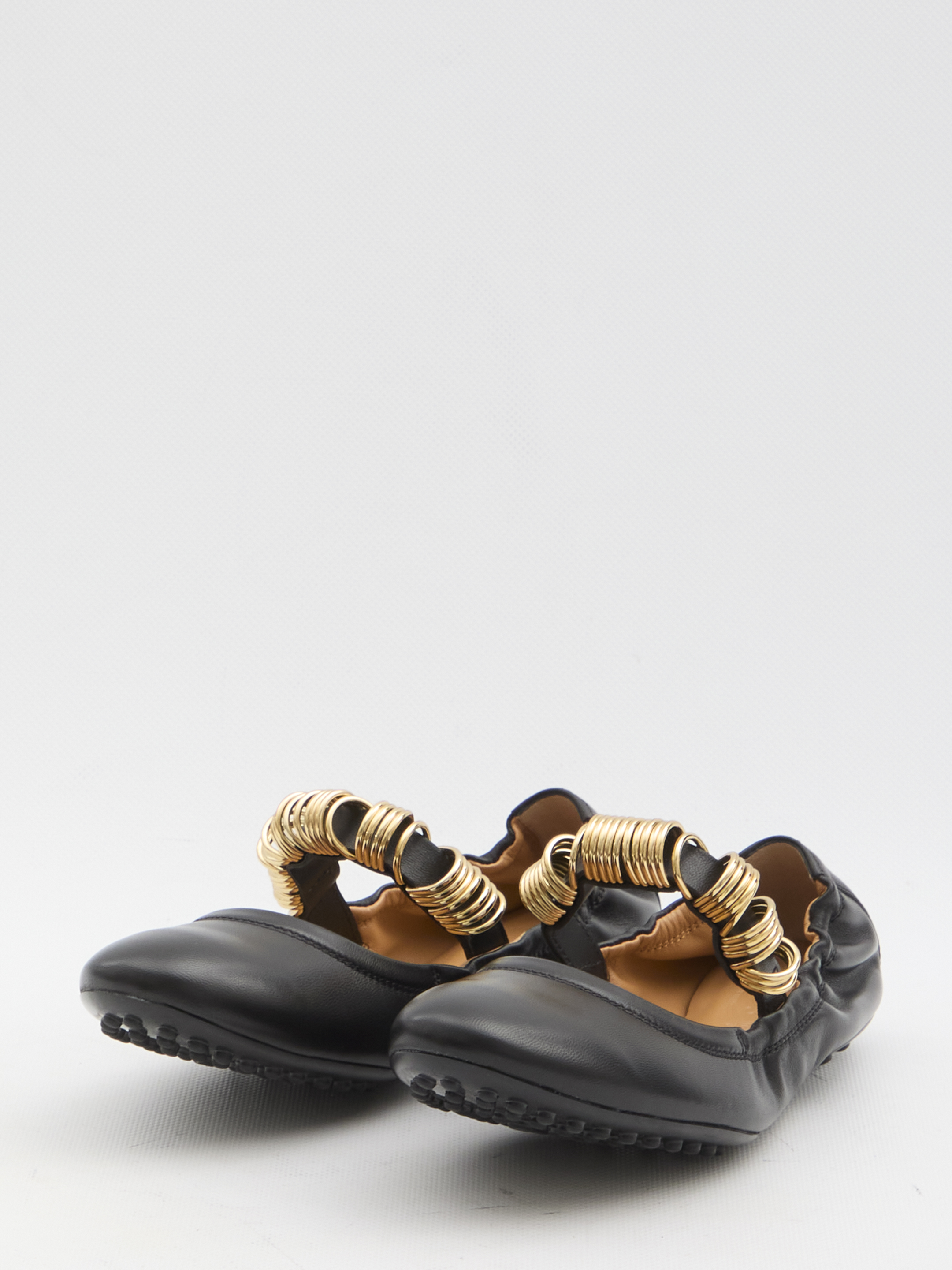 Ballet flats with eyelets hover